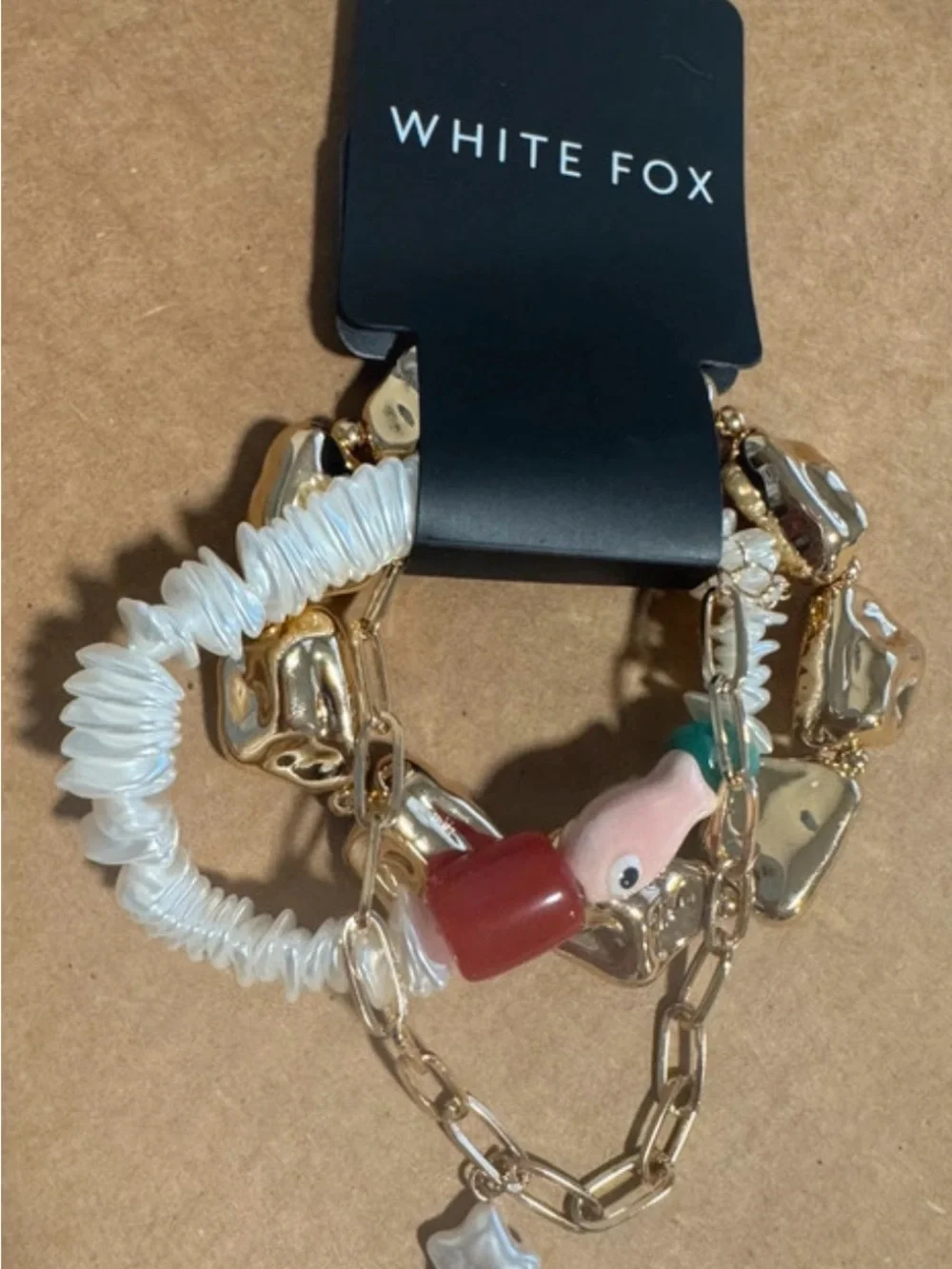 White Fox Boutique Multi-Chain Bracelet in Gold, White & Red